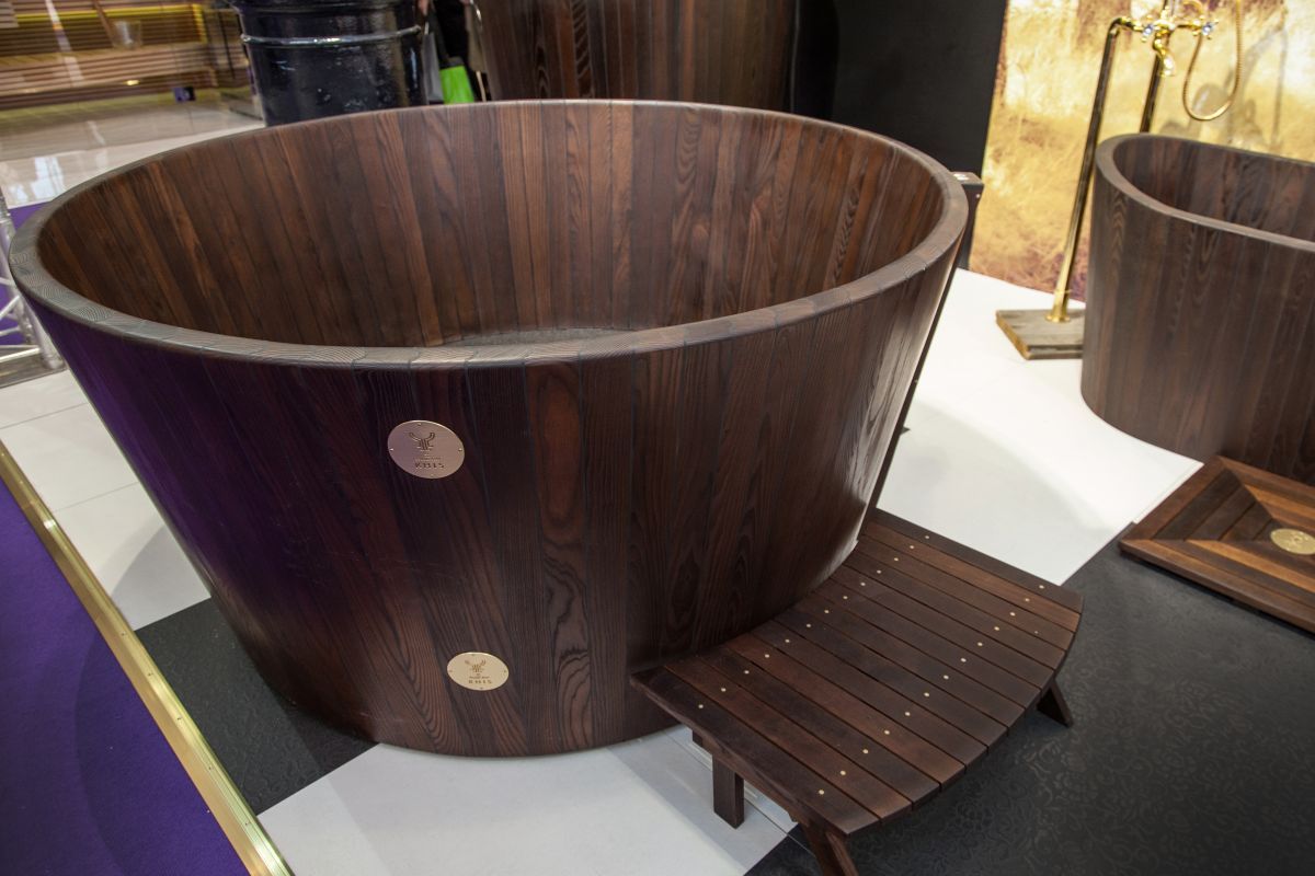KHIS is an Estonian company that specializes in individually handcrafted and assembled wooden bathtubs made from Nordic Ash. This beautiful round tub also comes with matching a step stool.