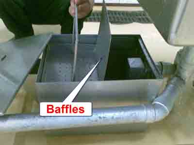 Baffles on a commercial grease trap
