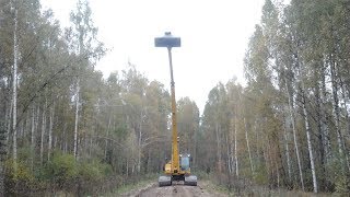 Очистка русла канавы длинноруким экскаватором. Long Reach Excavator Dredging Canal.