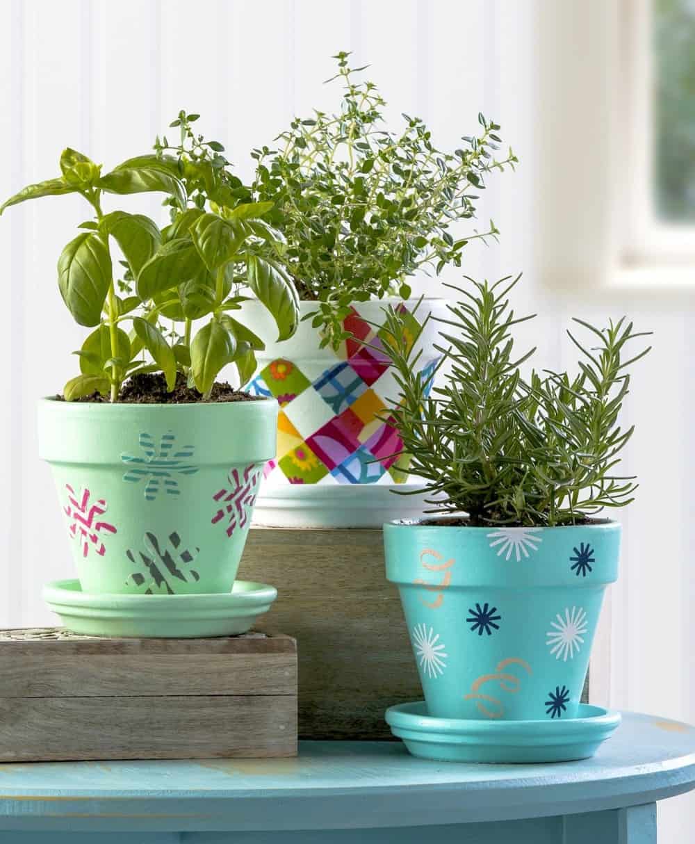 Flower pot decoration using fabric, stencils, and washi tape